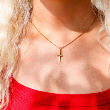 Chain necklace with sword pendant life style