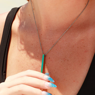 Chain necklace with vertical bar pendant lifestyle photo