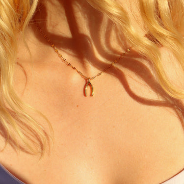 Gold Wishbone Charm on chain