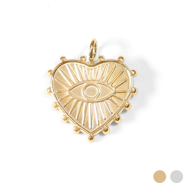 A gold-colored stainless steel textured heart-shaped charm with an evil eye design in the center.