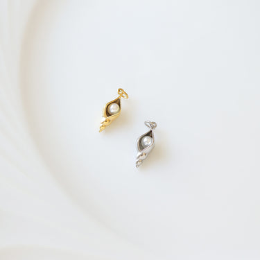 Conch shell charm with pearl