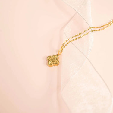 Sunburst Gold Clover Charm on chain