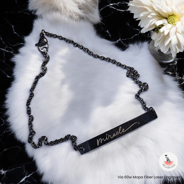 Blank Curved Bar Bracelet/Anklet with an engraving that says "miracle" in a cursive font