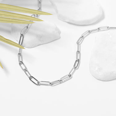 Paperclip chain necklace with coastal studio background
