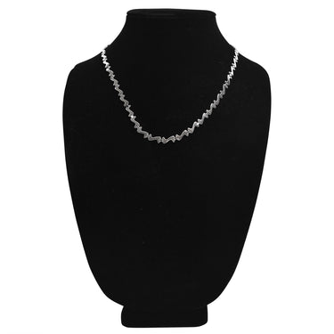 Stainless steel swish wave fancy chain necklace on a black velvet bust.