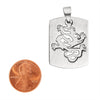 Stainless steel cutout dragon pendant with a penny for scale.