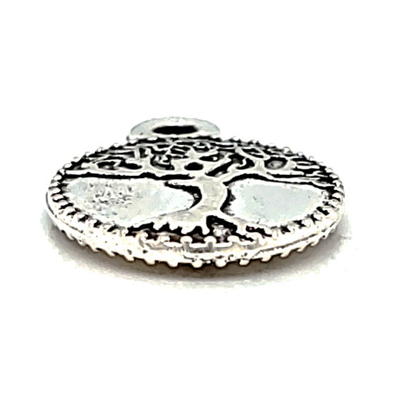 Small oval tree charm at an angle.