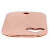 Copper blank heart cutout dog tag pendant at an angle.