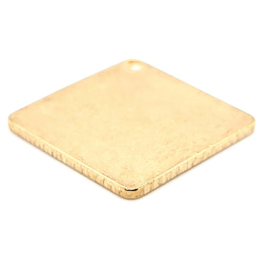 Brass blank diamond pendant at an angle.