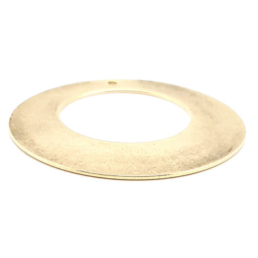 Brass blank holed washer pendant at an angle.