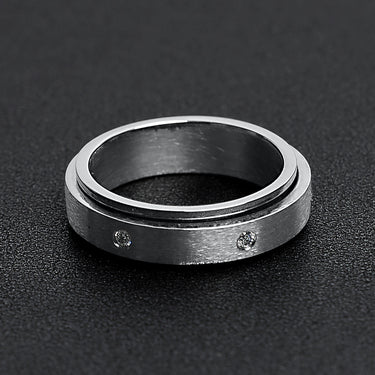 CZ Stones In Center Spinner Stainless Steel Ring Lifestyle