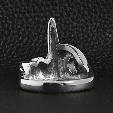 Stainless steel polished FTW middle finger ring back view on a black leather background.