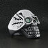 products/SCR4108-Detailed-Green-CZ-Eyed-Skull-Stainless-Steel-Ring-Lifestyle-Side.jpg