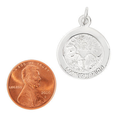 Sterling silver "Confirmation" pendant with a penny for scale.