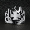Sterling silver Maltese Cross flame ring on a black leather background.