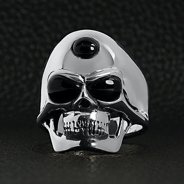 Sterling silver black eyed skull with 3rd eye ring on a black leather background.