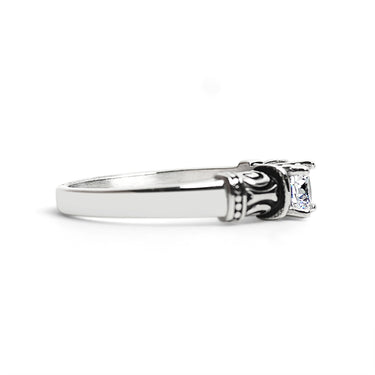CZ Center With Decorative Accents Stainless Steel Ring Side