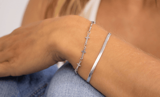 Why Every Retailer Should Stock Cross Jewelry This Season