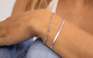 Why Every Retailer Should Stock Cross Jewelry This Season