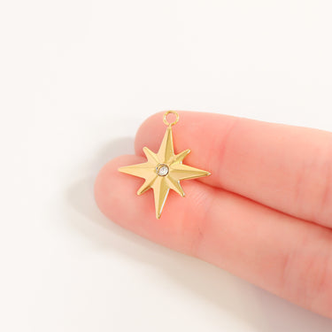 Compass star with CZ stone center scale