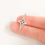 Compass star pendant with CZ stone in center scale