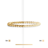 Gold ring with '18K' and '14K' labels on a white background