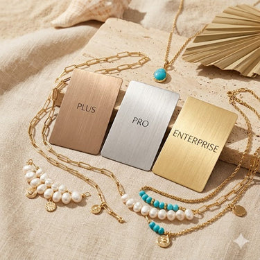 Jewelry with 'PLUS', 'PRO', and 'ENTERPRISE' labels on a textured surface.