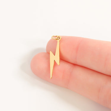 Gold Lightning Bolt Charm- scale shot 