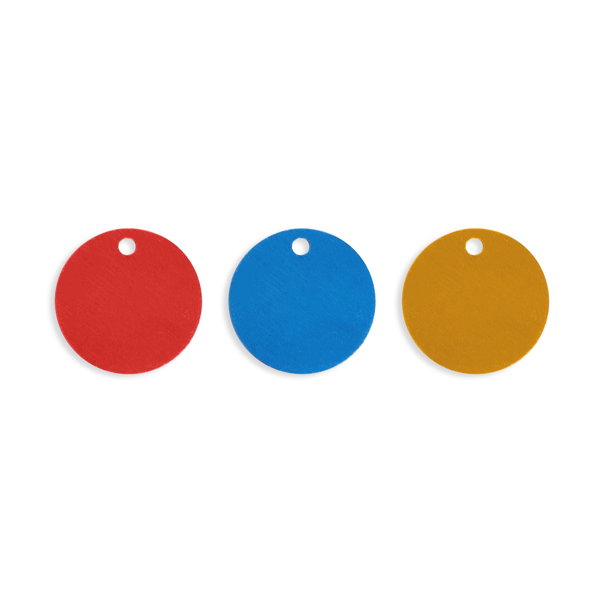 Round engravable tags in the colors red, blue, and yellow