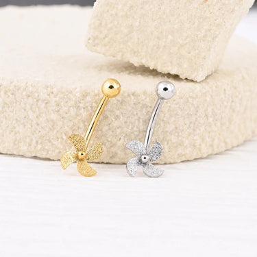 Wholesale jewelry 18K Gold PVD Stainless Steel Whimsy Pinwheel Belly Ring- gold and stainless studio  