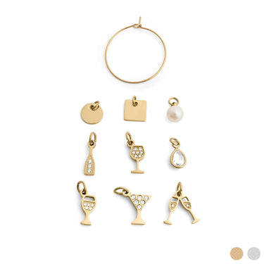Collection of gold charms including a hoop, round, square, circle, and various drink-themed pendants on a white background.