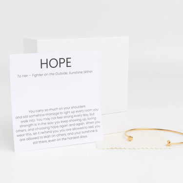 Gold Adjustable Cuff with Cancer Ribbon Charm GIft Set on a card with 'HOPE' text and message