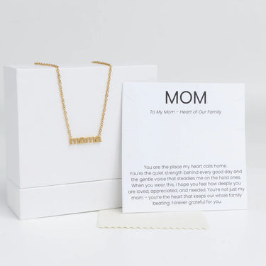 Gold Mama Necklace Gift Set on a white box with a card for 'Mom' on a white background