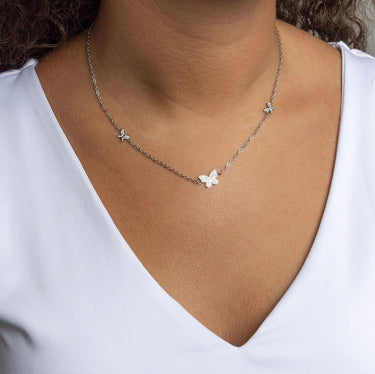 Butterfly Butterfly Necklace Gift Set on a person wearing a white top