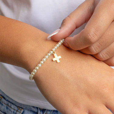 Pearl Pearl Beaded Bracelet with Cross Gift Set with a gold cross charm on a wrist
