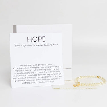 Gold Pearl Beaded Bracelet with Cross Gift Set on a card with 'HOPE' text and message
