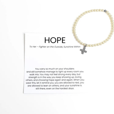 Silver Pearl Pearl Beaded Bracelet with Cross Gift Set with a cross charm on a white background
