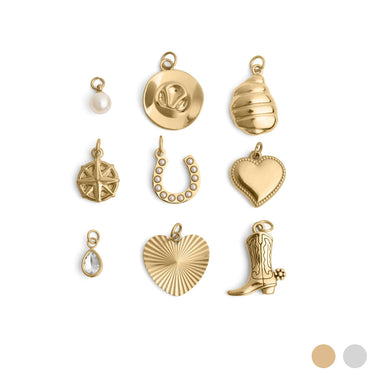 Collection of various gold western charms on a white background