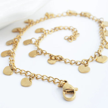 Gold Dangle Hearts Anklet with claw-shaped clasp on a white background