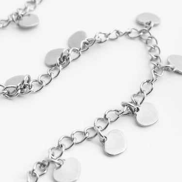 Silver Dangle Hearts Anklet with heart-shaped charms on a white background