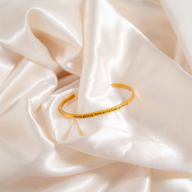 Never give up Engraved Bangle Bracelet