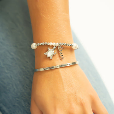 8mm Kiska Glass Pearl Stretch Bracelet with charms and a bangle bracelet