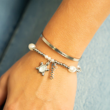 8mm Kiska Glass Pearl Stretch Bracelet with charms and a bangle bracelet