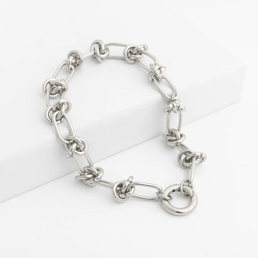 Silver chain bracelet on a white background