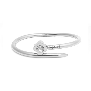 Silver bracelet with a small diamond on a white background