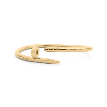Gold ring with a unique design on a white background