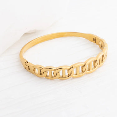 Gold chain bracelet on a white background