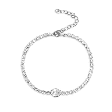Silver bracelet with clear stones on a white background