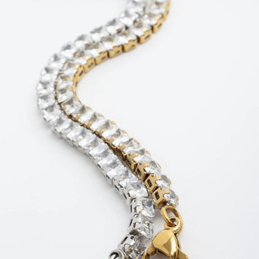 Gold and clear crystal bracelet on a white background