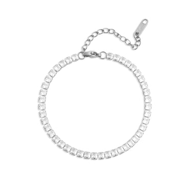 Silver bracelet with clear gemstones on a white background